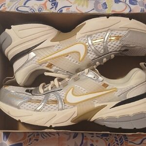 Nike Women's Silver and Gold Sneakers